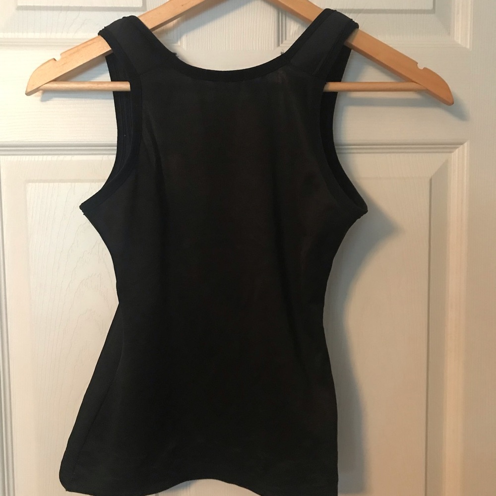 Naomi and Nicole tank size XL really hides the extra skin unwanted!